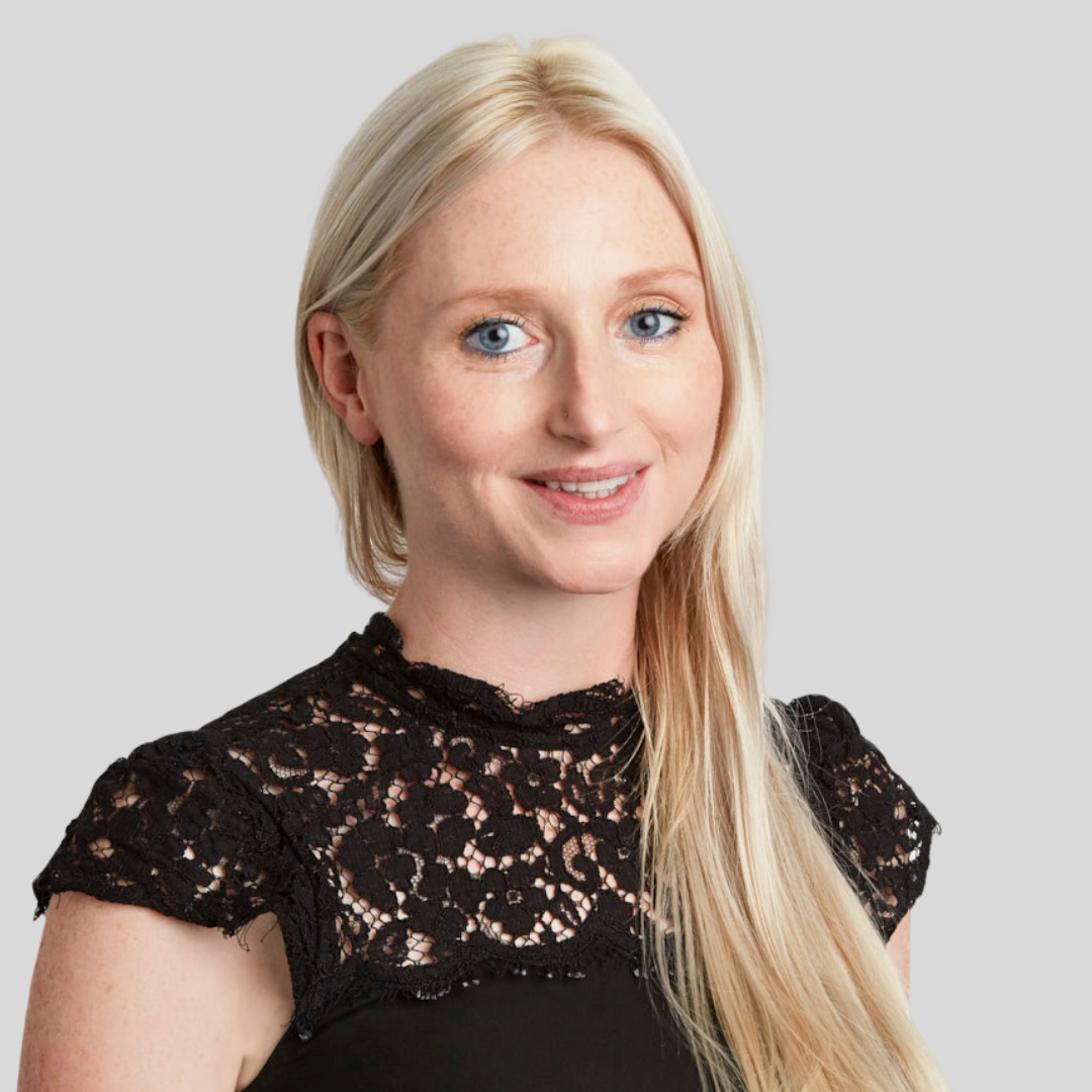 Elizabeth Trewhella wearing a black top with a lace neckline