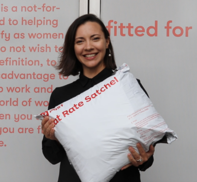 Bec, our Virtual Client Services Coordinator is beaming as she holds a full 5kg postage bag filled with clothing for a client.