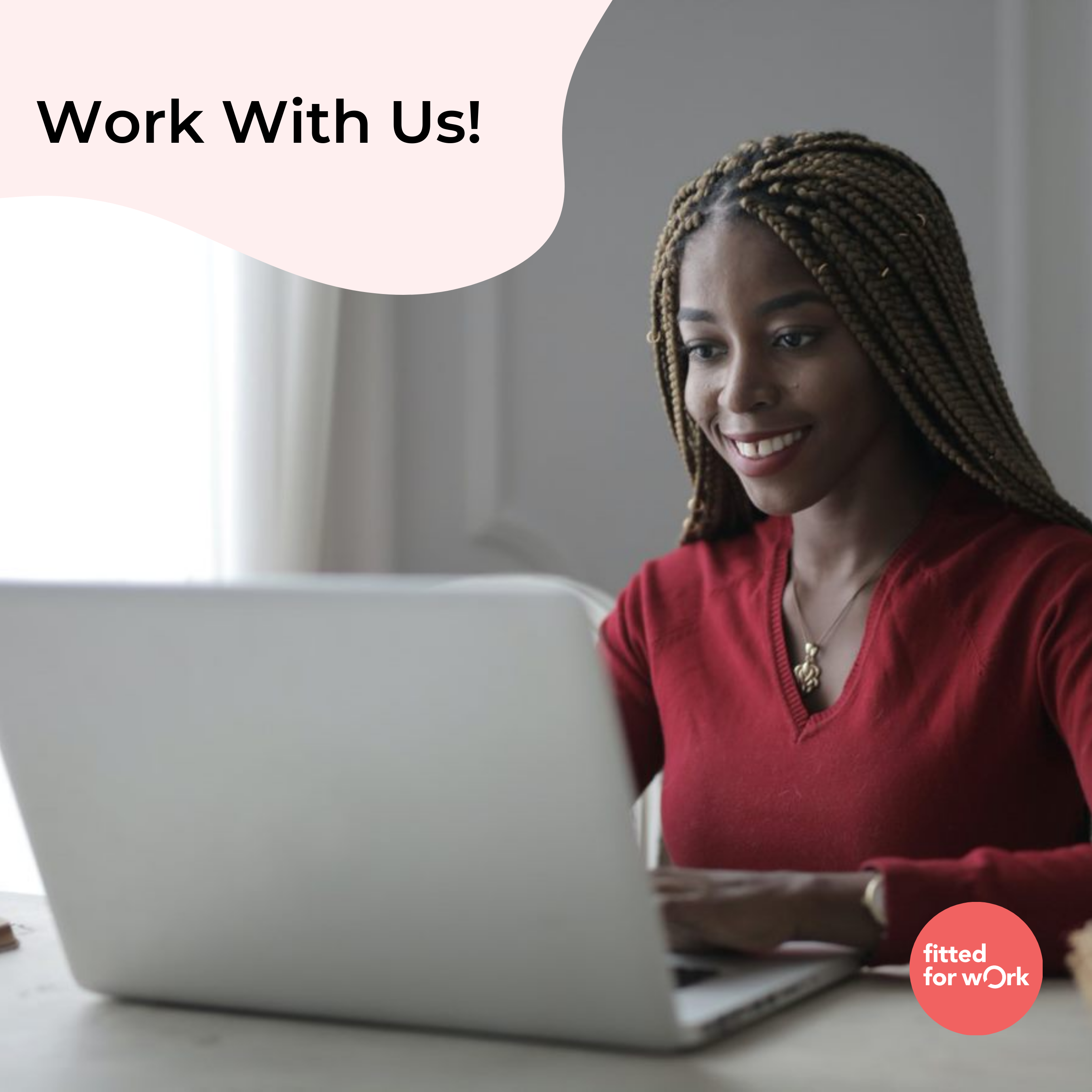 dark skinned woman with braids working on computer