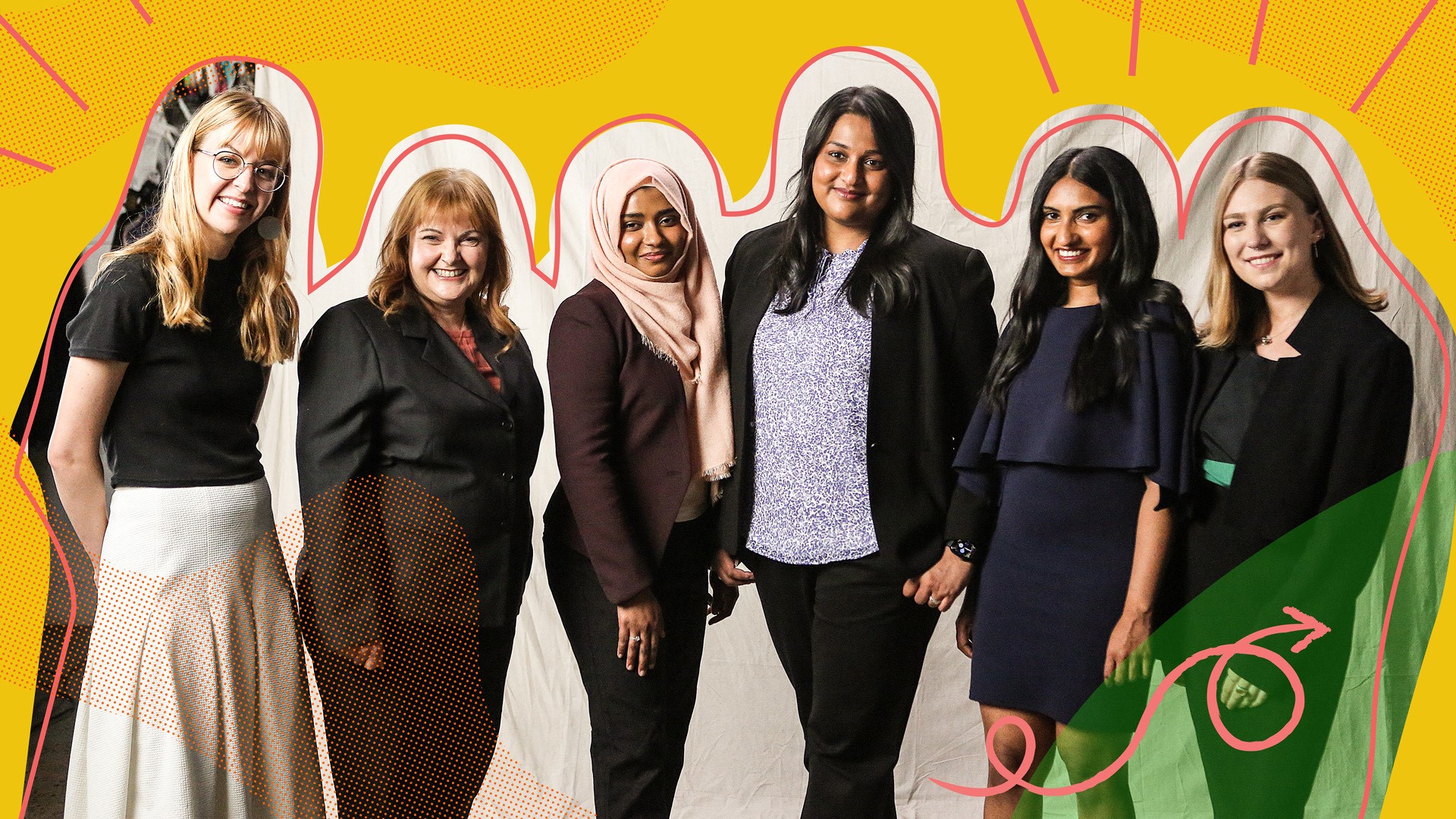 Microsoft staff and Fitted for Work staff and clients pose together in front of a sheet background. They are a diverse group of women.