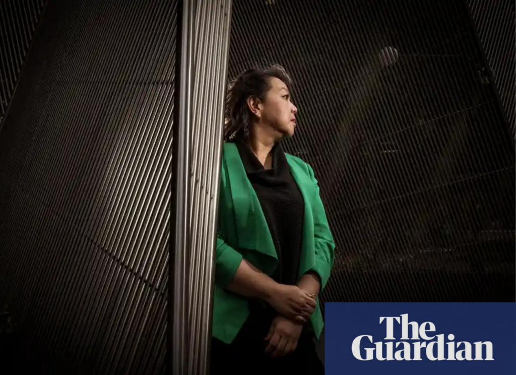 The Guardian article, Fitted for Work client Gwen Kong looks into the distance thoughtfully
